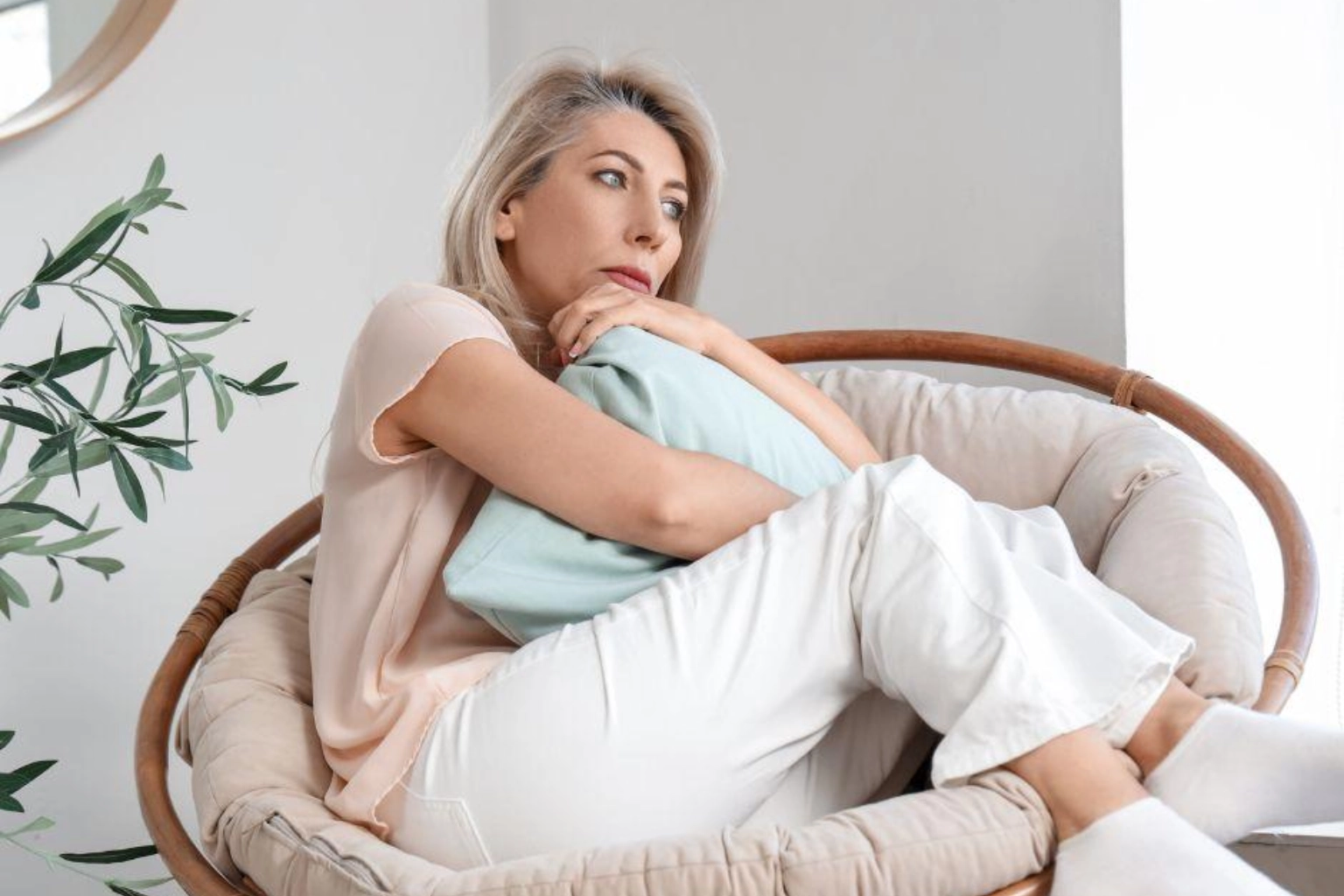 Older woman worried in chair